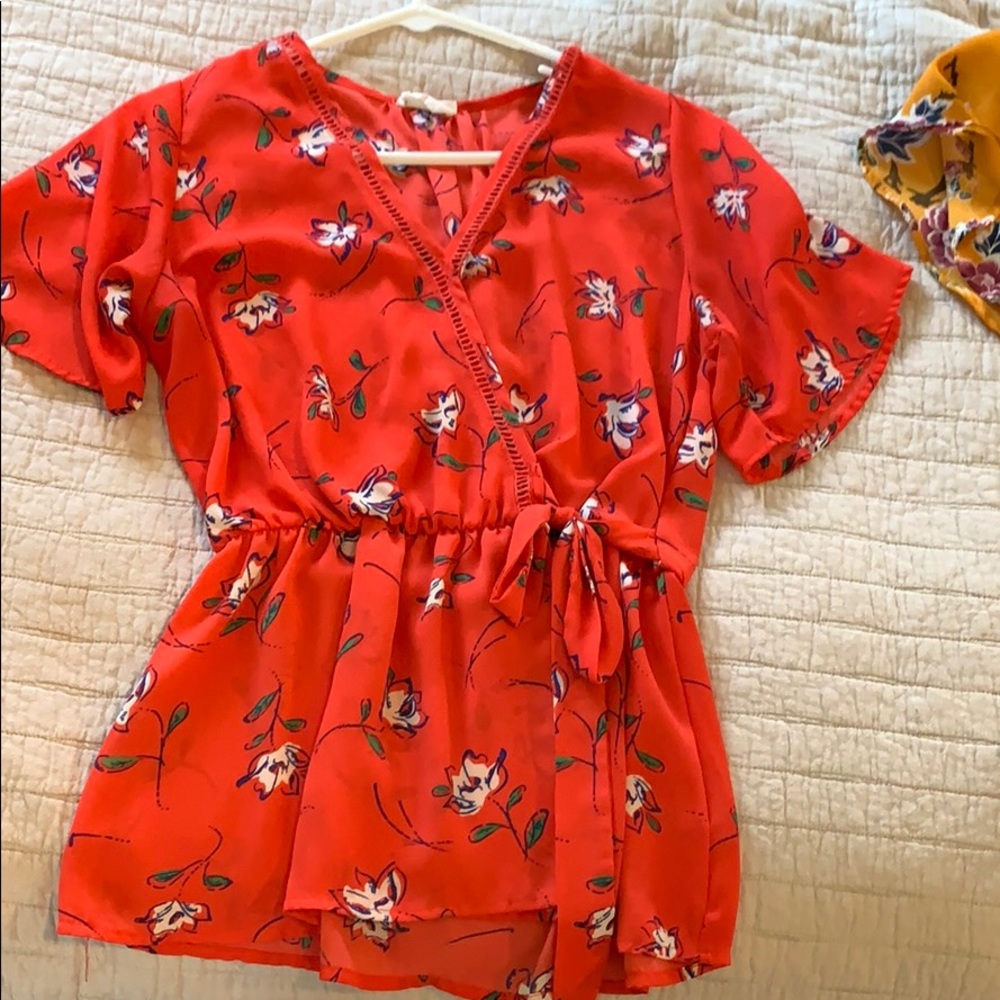 Red blouse ties on